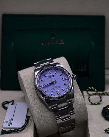 Rolex Oyster Perpetual "Lavender" (Boite + Papiers + Full Stickers)